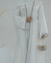 abaya with hijab ,abaya online shopping,modest fashion abaya,buy abaya online,black abaya dress,abaya with hijab set,open abaya kimono,abaya for Eid 2025,luxury abaya collection,sparkling black,abaya for evening wear,velvet abaya with pearl detailing,plus size modest abaya dresses,lightweight summer abaya 2025,bridal white abaya with lace,embroidered abaya for special occasions,modern abaya styles for young women,online abaya shopping in UAE,abaya boutiques near me,designer abaya, monochrome abaya, Dubai st