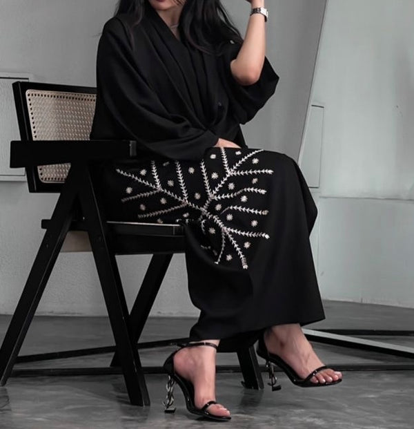 Lila - The black abaya that moves with you from early meetings to late-night duas.