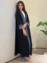 Elegant Black and Blue Abaya – Modest Fashion with Modern Flair