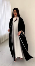 Your Everyday Essential black abaya with Elegant Flow - One Abaya, Endless Possibilities