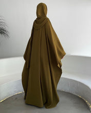 Olive Abaya With Hijab – Subtle Sophistication .The perfect blend of comfort and coverage.