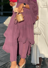 2 MUSLIM WOMEN WEARING MODEST FASHION DRESSES MADE IN DUBAI