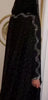 Black sparkly abaya with shimmering details, perfect for evening wear and formal occasions